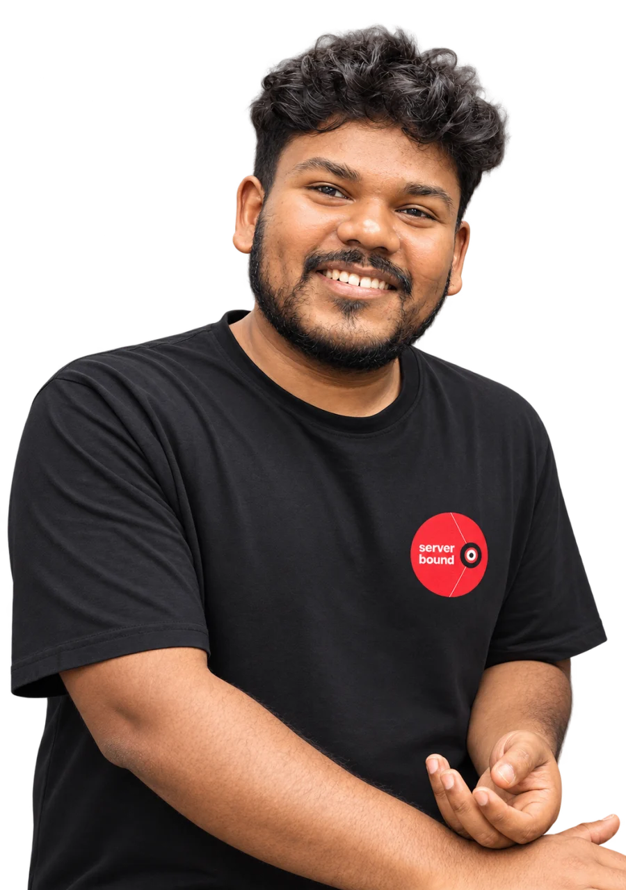 Aswin Behera, smiling, in a black serverBound T-shirt.